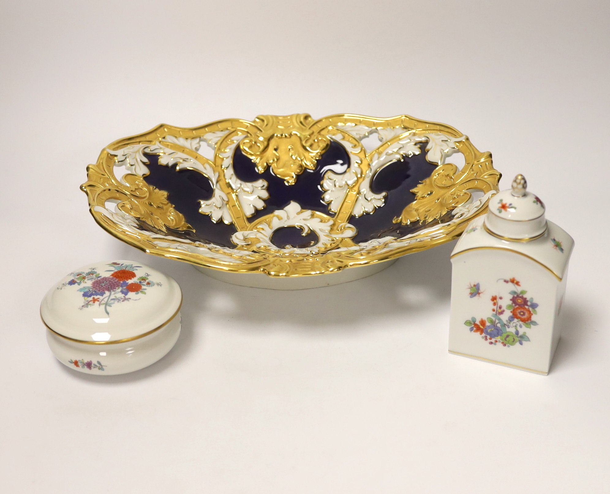 A Meissen gilt and blue glazed dish together with a similar floral caddy and box and cover, dish 33cm